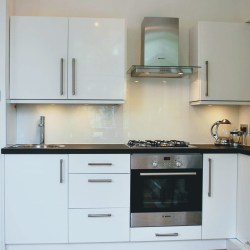 small Ikea white kitchen with oven and hob
